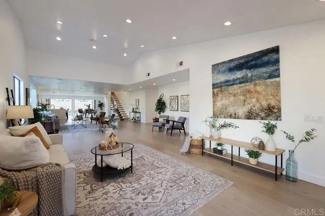 a spacious bedroom with a bed and window