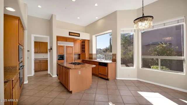 a view of a hallway with furniture and a fireplace