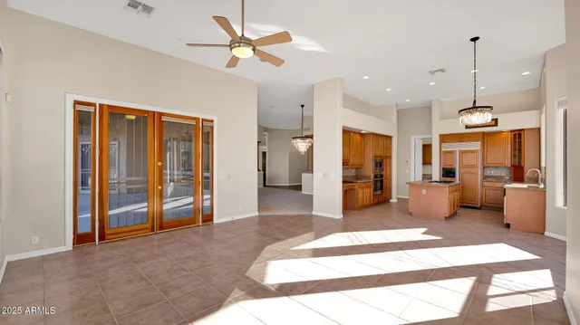 a view of an empty room with a fireplace