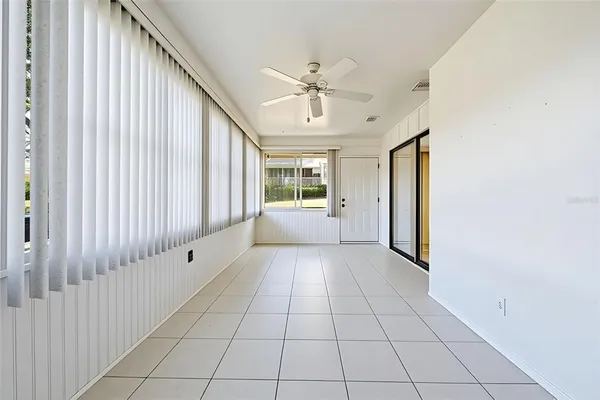 a view of an empty room and window