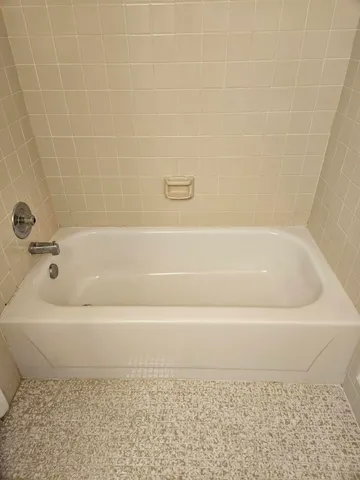a bathroom with a bathtub