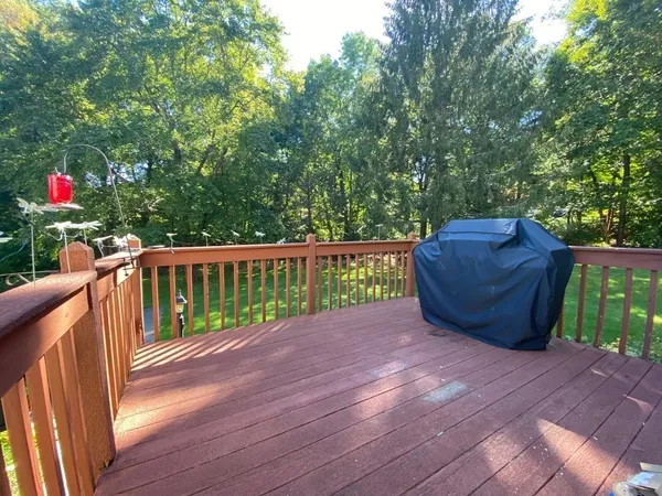 a view of a deck with a backyard