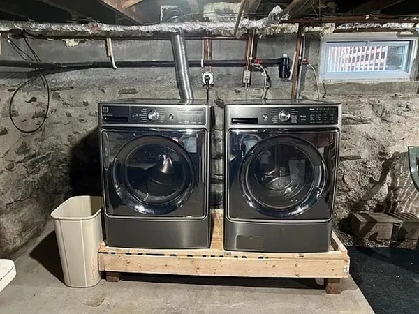 a utility room with dryer and washer