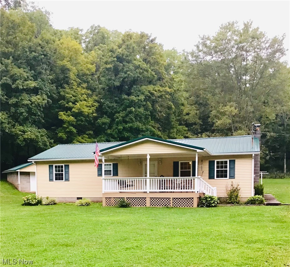775 Millstream Valley Road Ravenswood, WV 26164 - Photo 1 of 26 Single story home featuring a front lawn and wooden deck