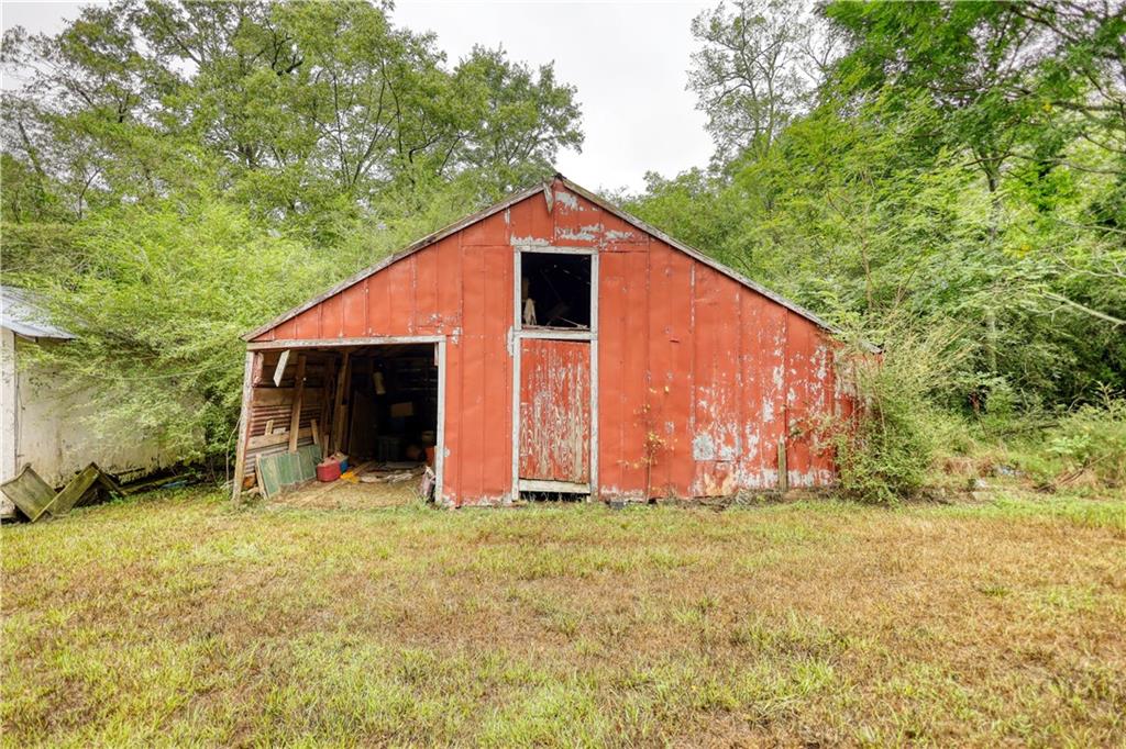 5011 Penfield Road Union Point, GA 30669 - Photo 54 of 68 a view of a house with backyard and garden