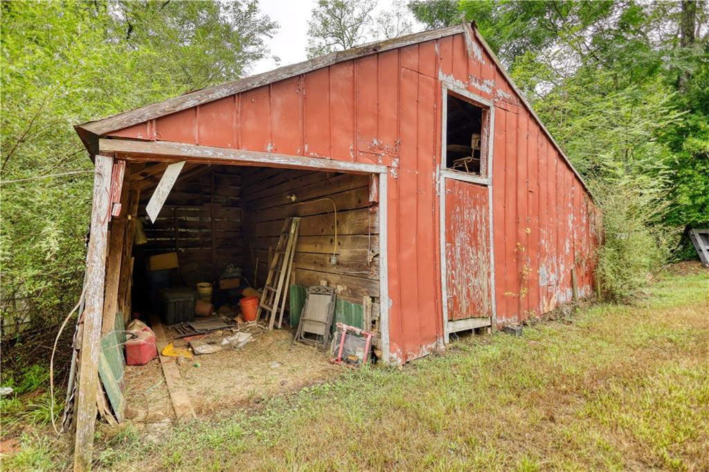 5011 Penfield Road Union Point, GA 30669 - Photo 55 of 68 a view of a house with backyard
