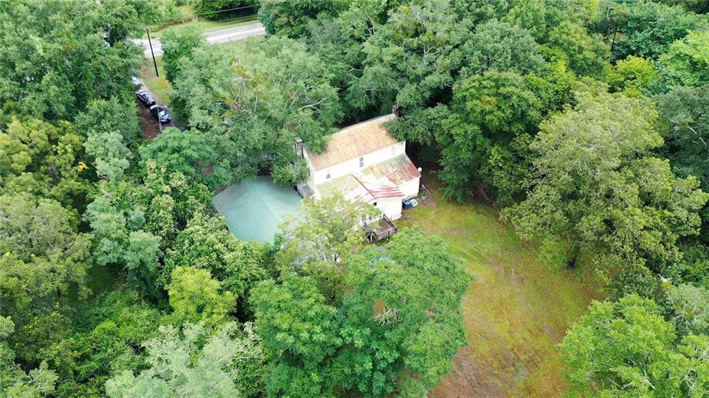 5011 Penfield Road Union Point, GA 30669 - Photo 63 of 68 an aerial view of residential house with outdoor space and trees all around