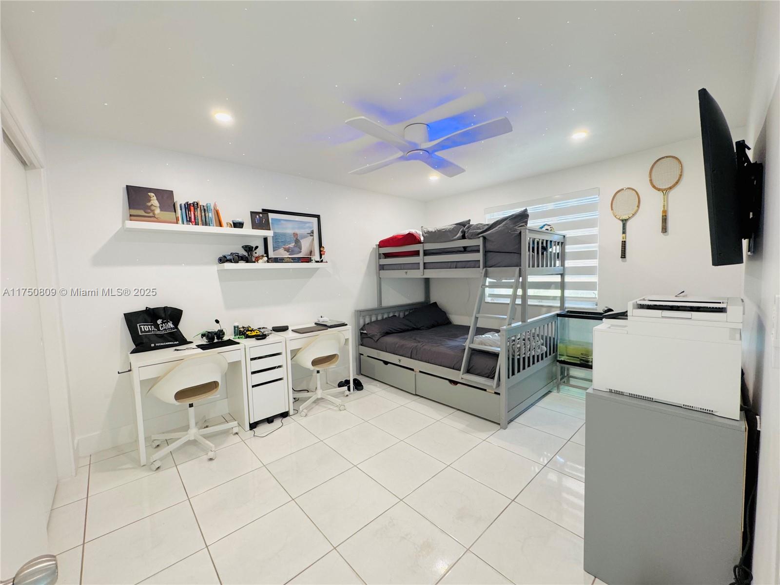 9394 Southwest 77th Avenue, Unit F1 Miami, FL 33156 - Photo 12 of 24 a living room with furniture