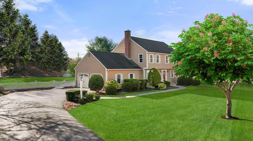 21 Worcester Road Norfolk, MA 02056 - Photo 1 of 40 a front view of a house with garden