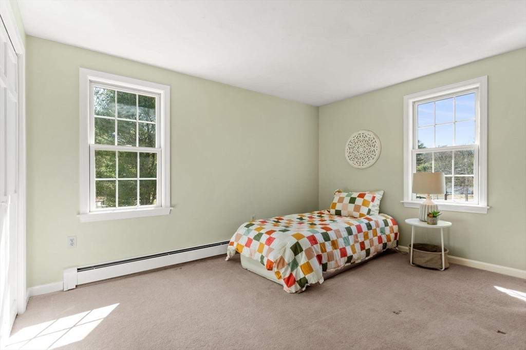 21 Worcester Road Norfolk, MA 02056 - Photo 27 of 40 a bedroom with bed and a window