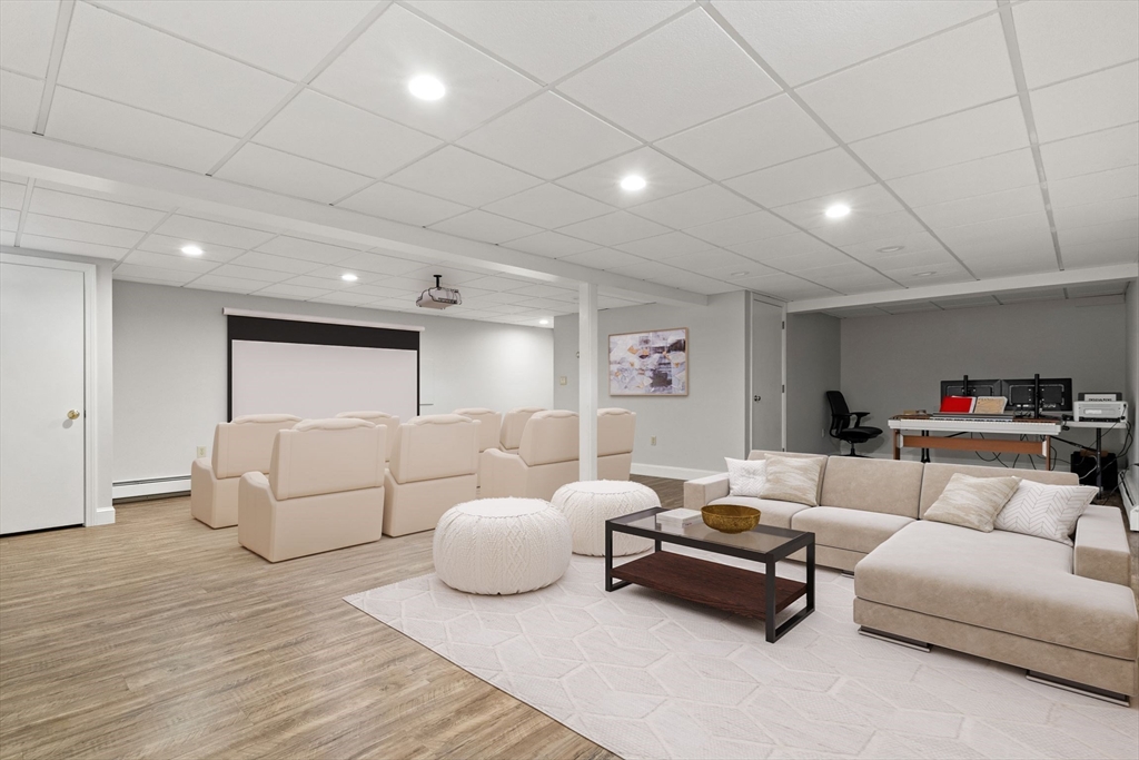 21 Worcester Road Norfolk, MA 02056 - Photo 28 of 40 a bedroom with furniture and a couch