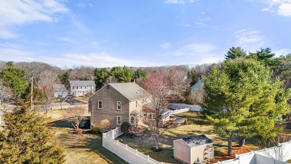 21 Worcester Road Norfolk, MA 02056 - Photo 30 of 40 a view of a house with a big yard plants and large trees