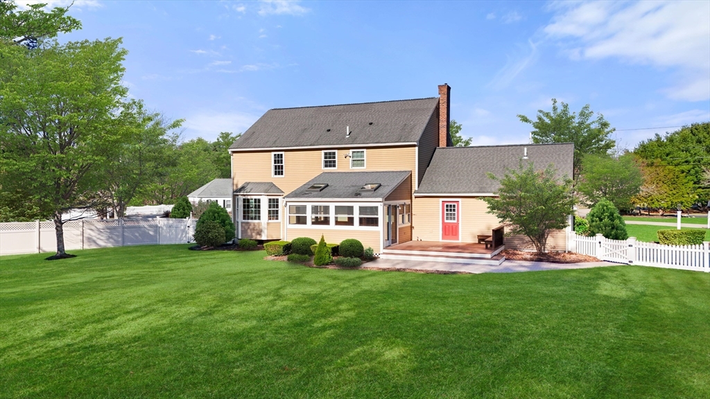 21 Worcester Road Norfolk, MA 02056 - Photo 31 of 40 a view of a house with a yard and sitting area