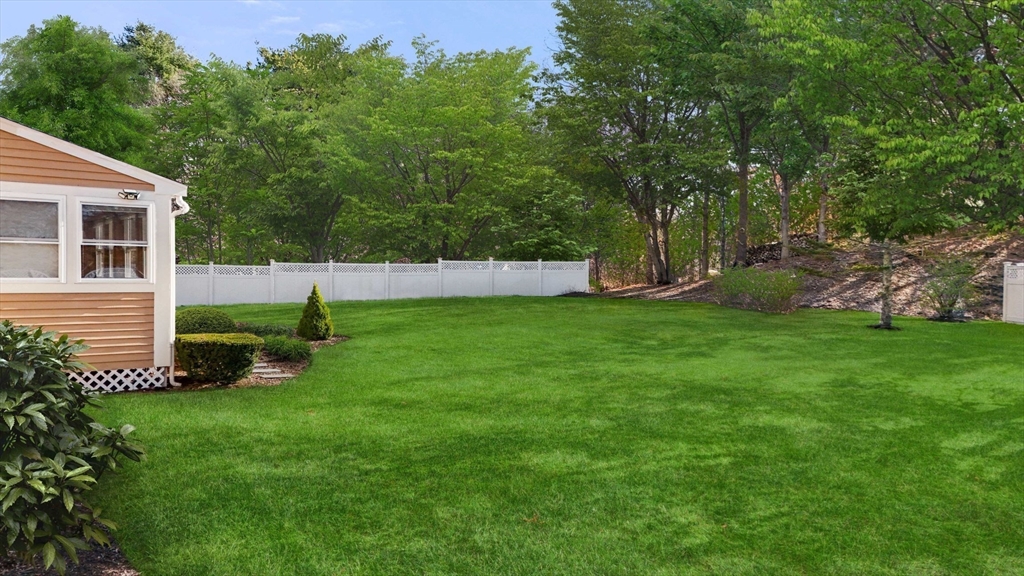 21 Worcester Road Norfolk, MA 02056 - Photo 32 of 40 a view of a house with a yard and a tree