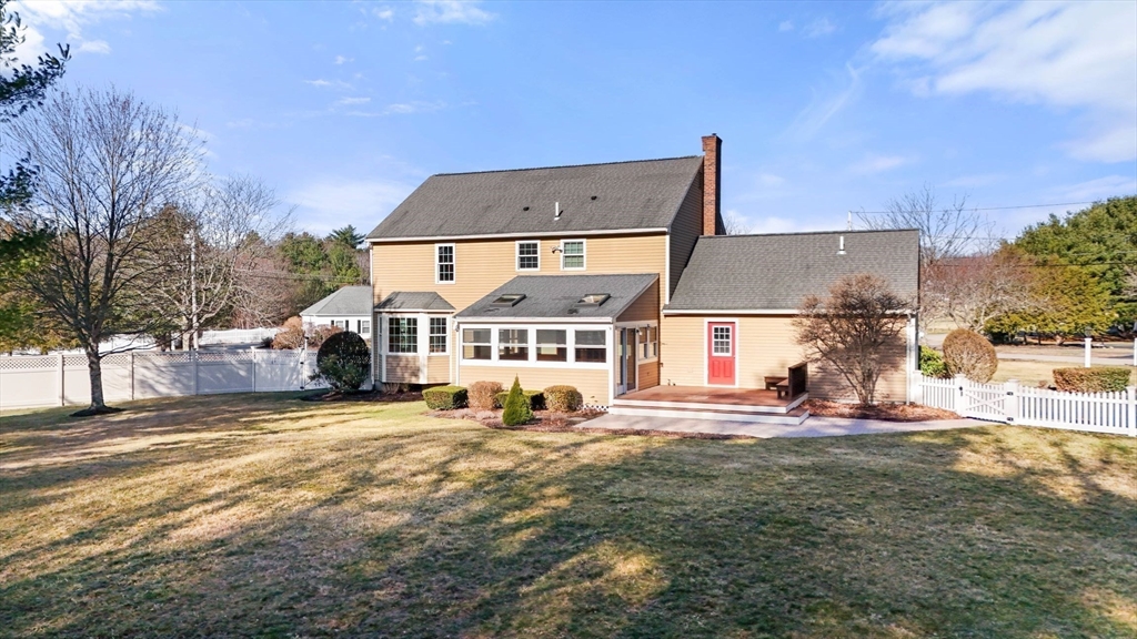 21 Worcester Road Norfolk, MA 02056 - Photo 34 of 40 a view of a big house with a big yard and large trees