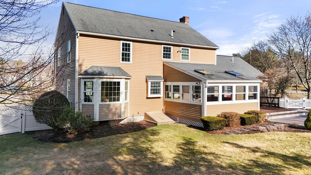 21 Worcester Road Norfolk, MA 02056 - Photo 37 of 40 a front view of a house with a yard