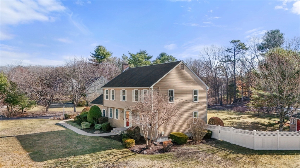 21 Worcester Road Norfolk, MA 02056 - Photo 4 of 40 a view of a house with backyard and sitting area