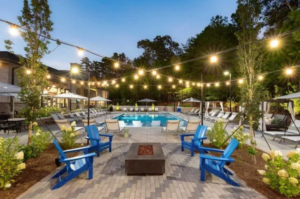 a view of a chairs and tables in the patio