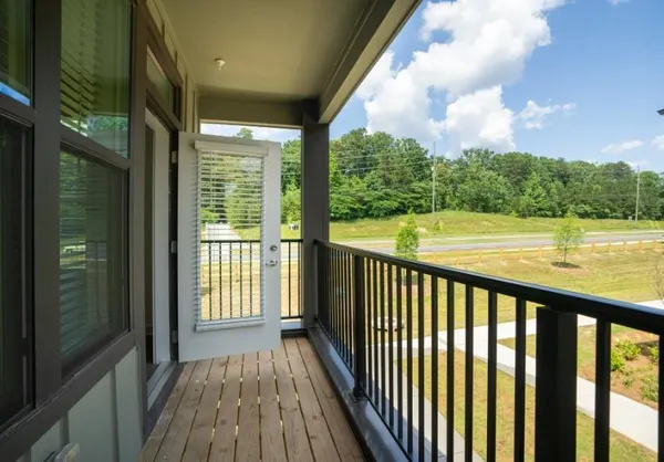 a view of a balcony with lake view