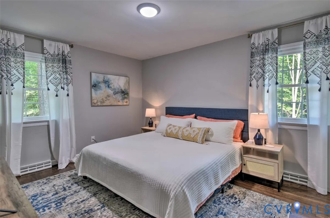 5180 Bemiss Road Richmond, VA 23234 - Photo 11 of 31 a bedroom with a bed and a window