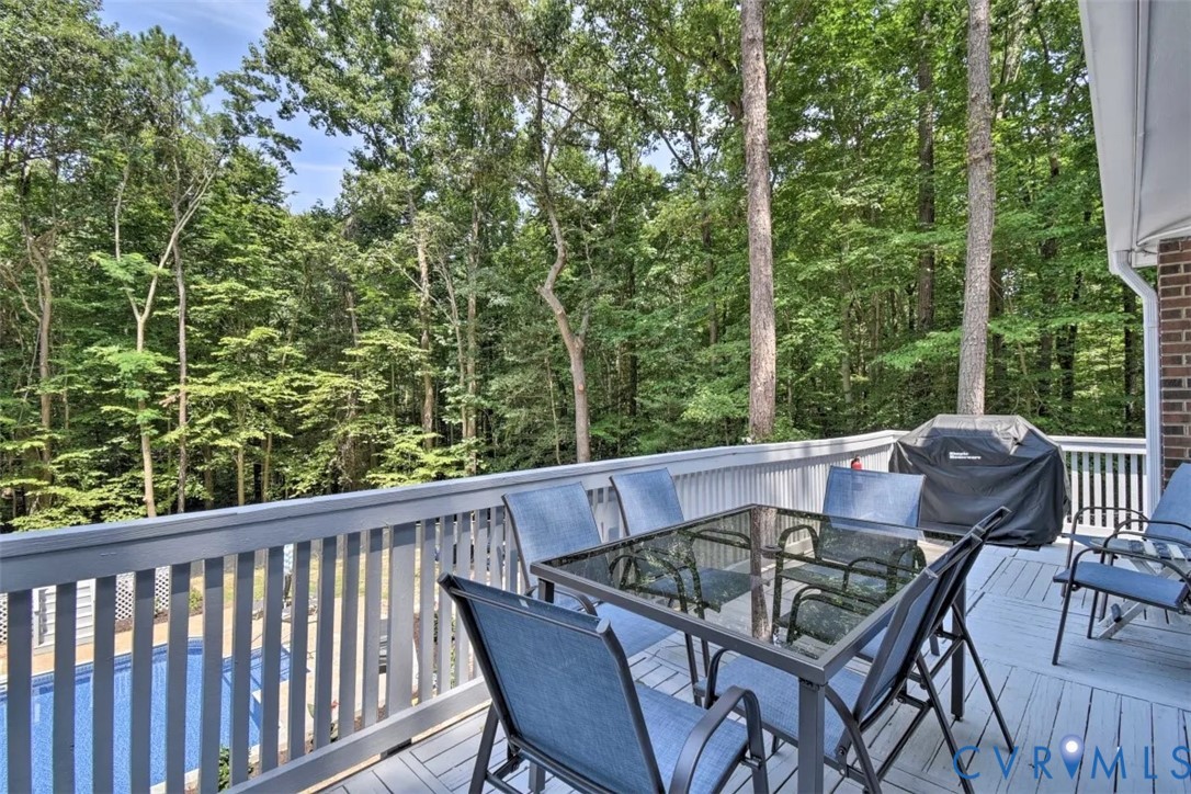 5180 Bemiss Road Richmond, VA 23234 - Photo 28 of 31 a view of chair and table in the deck