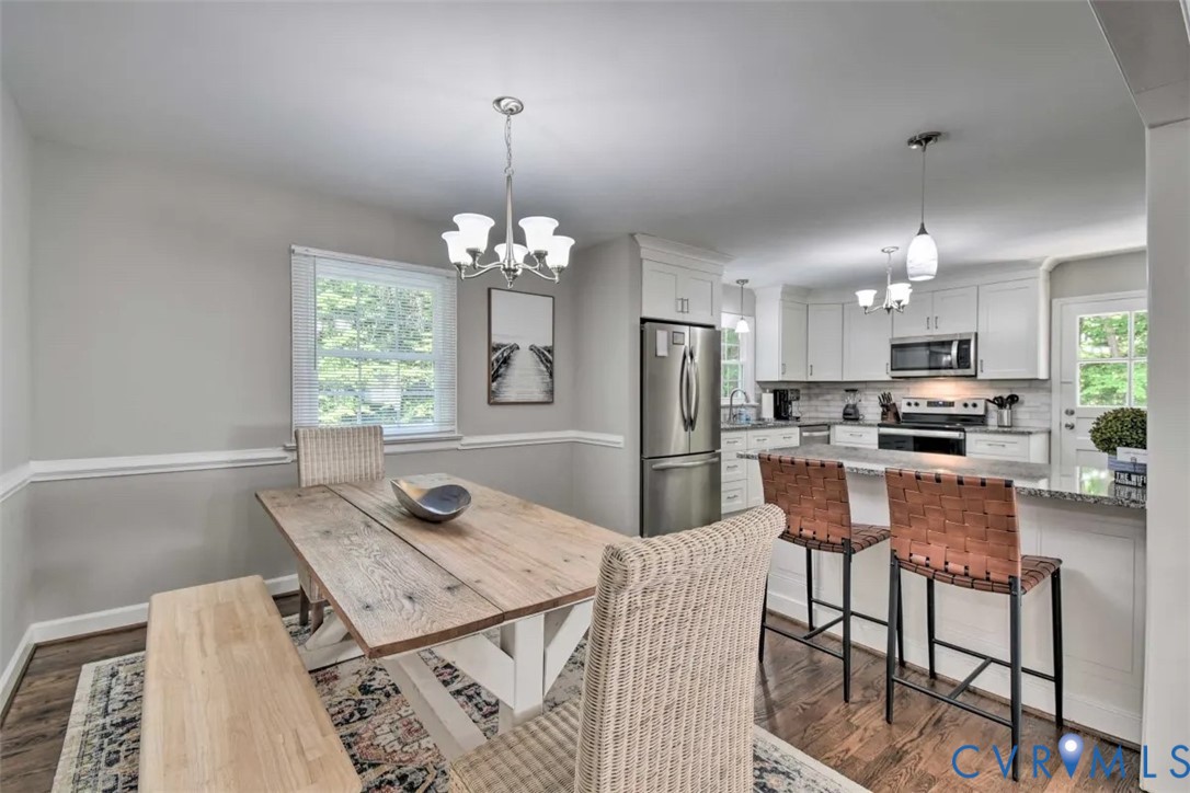 5180 Bemiss Road Richmond, VA 23234 - Photo 10 of 31 a view of a dining room and livingroom view