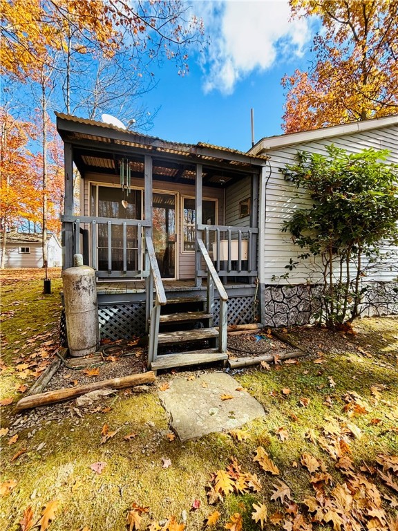 8707 State Line Road Lindley, NY 14858 - Photo 31 of 38 Back porch off of 3 season room