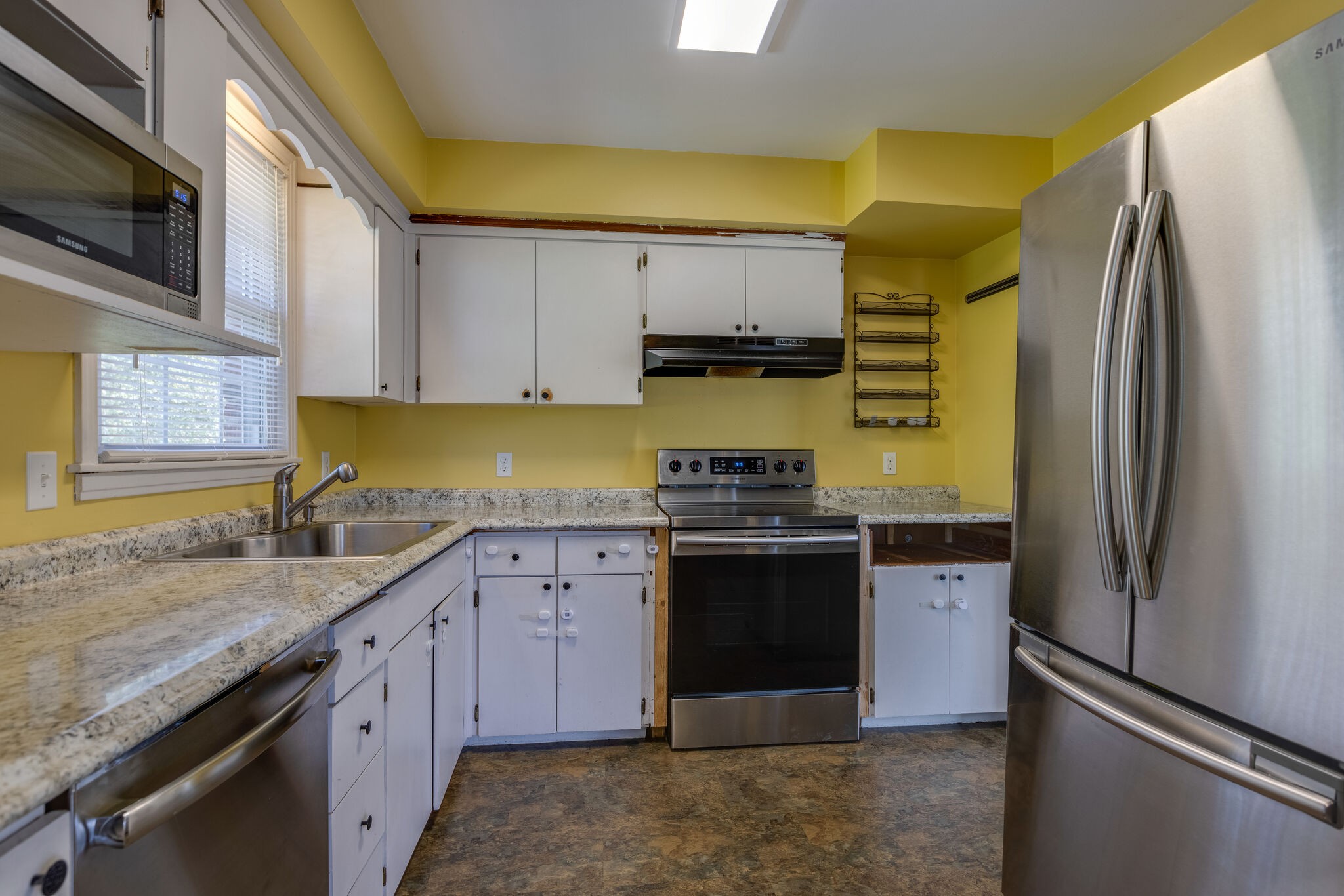 466 Rural Hill Road Nashville, TN 37217 - Photo 14 of 42 a kitchen with stainless steel appliances granite countertop a refrigerator stove and sink