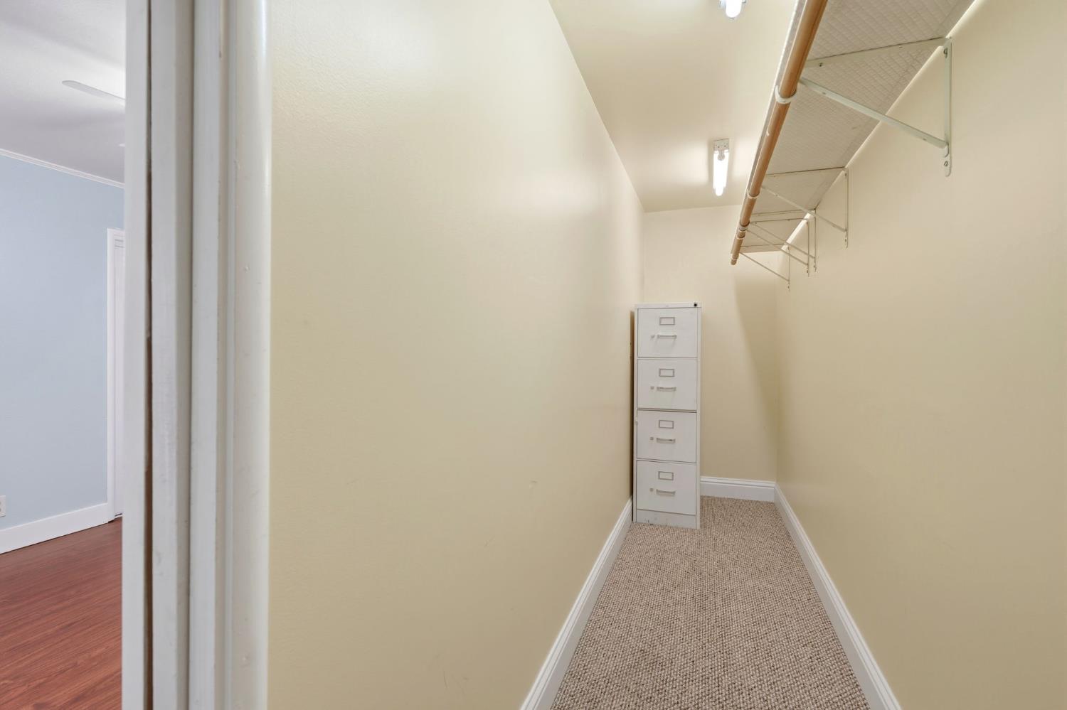 2826 East Hampton Way Fresno, CA 93726 - Photo 27 of 33 a view of hallway with stairs
