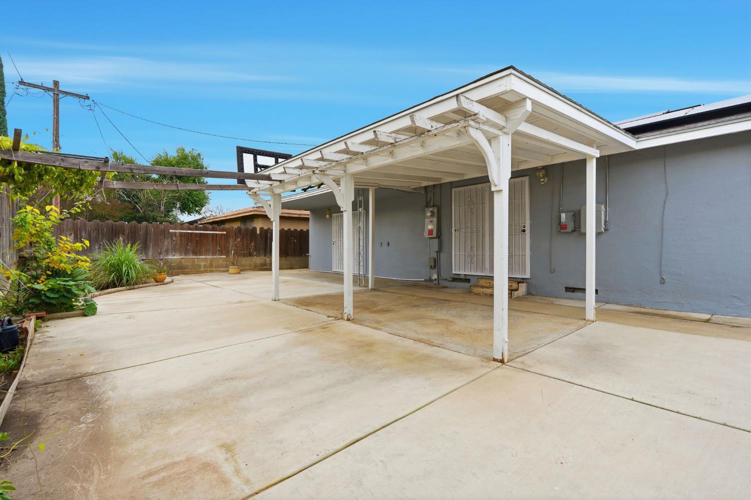2826 East Hampton Way Fresno, CA 93726 - Photo 30 of 33 front view of a house with a patio