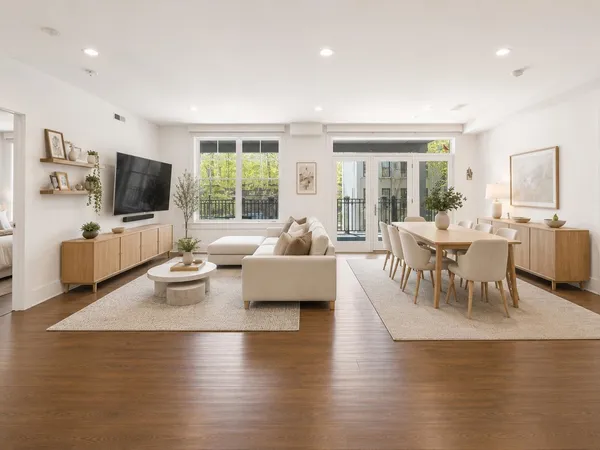 a living room with fireplace furniture and a flat screen tv
