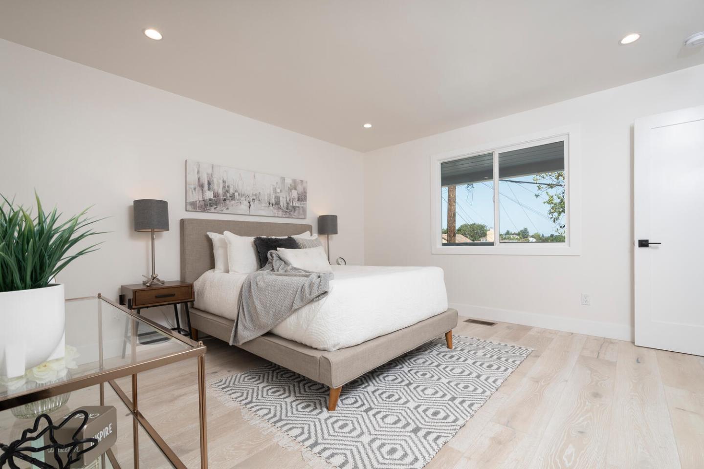 411 Ridge Road San Carlos, CA 94070 - Photo 17 of 40 a living room with furniture and wooden floor