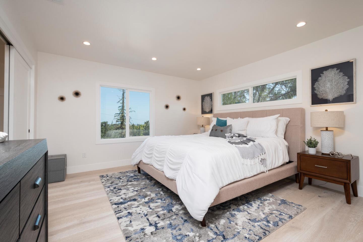 411 Ridge Road San Carlos, CA 94070 - Photo 22 of 40 a bedroom with a large bed and a window