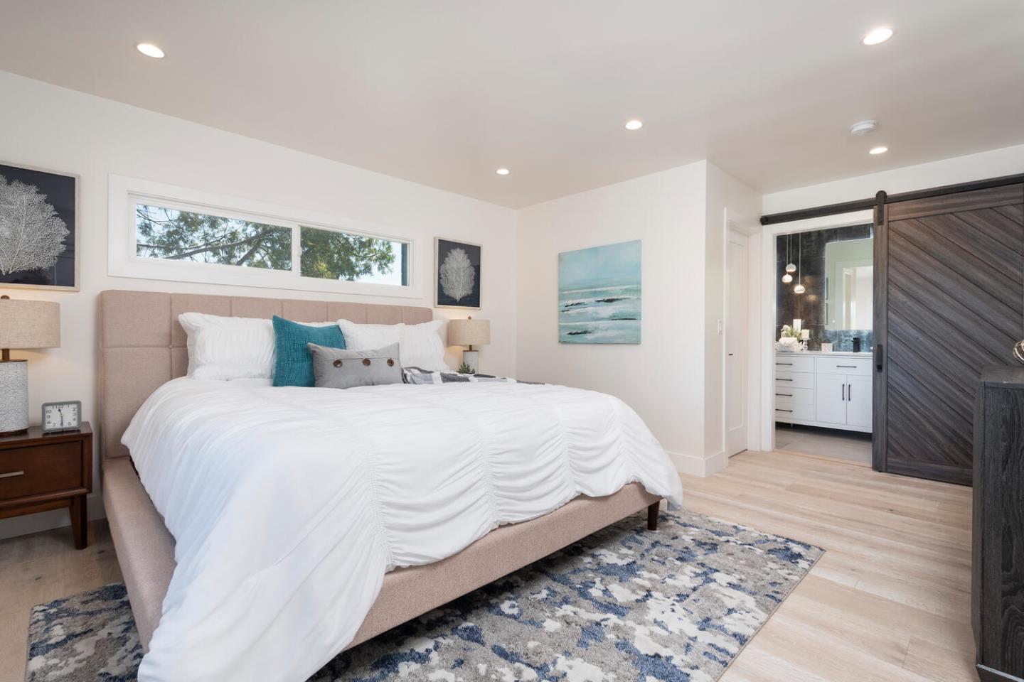 411 Ridge Road San Carlos, CA 94070 - Photo 23 of 40 a bedroom with a bed and a view of bathroom