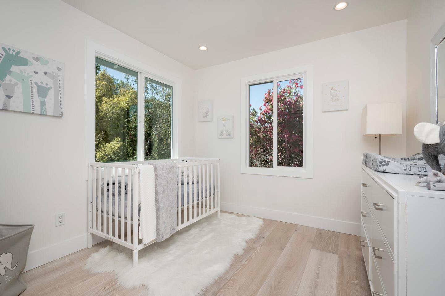 411 Ridge Road San Carlos, CA 94070 - Photo 26 of 40 a view of a hallway with windows