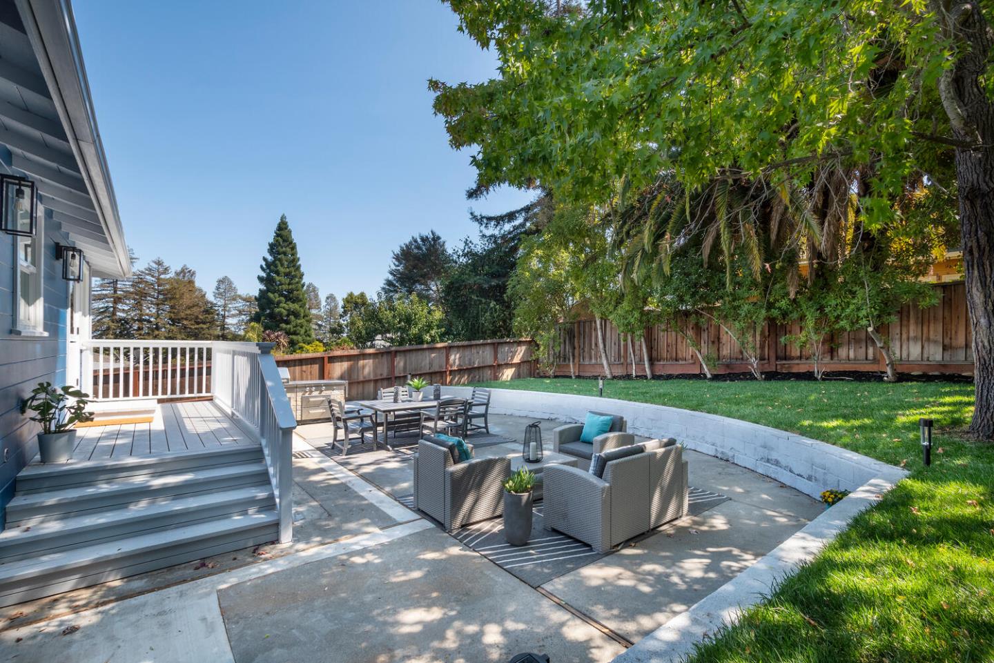 411 Ridge Road San Carlos, CA 94070 - Photo 30 of 40 a view of a patio with chairs and a table
