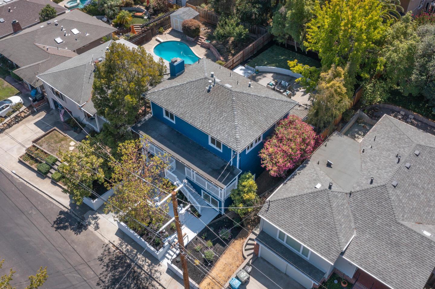 411 Ridge Road San Carlos, CA 94070 - Photo 34 of 40 an aerial view of a house with a yard and potted plants
