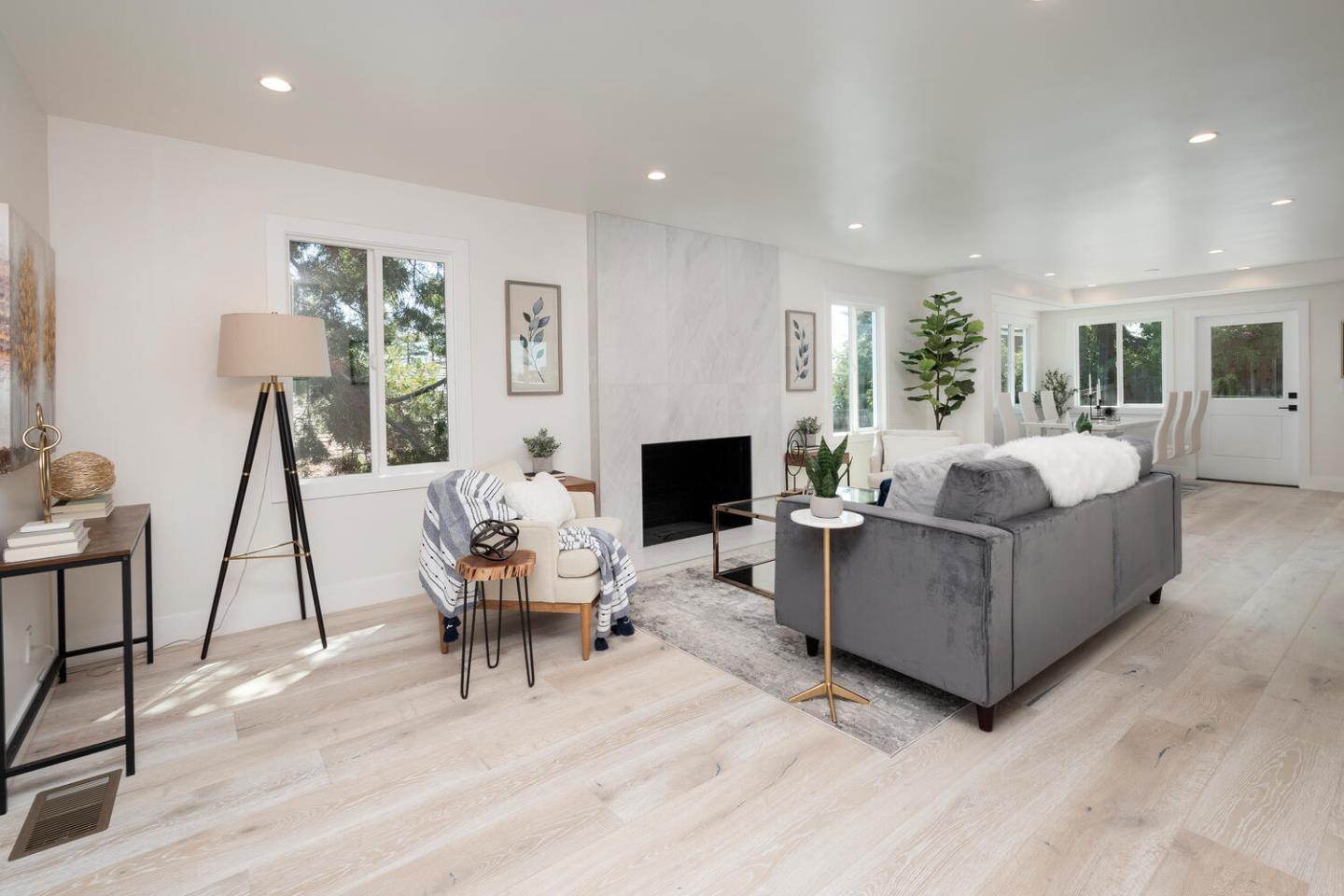 411 Ridge Road San Carlos, CA 94070 - Photo 6 of 40 a living room with furniture dining area and a fireplace