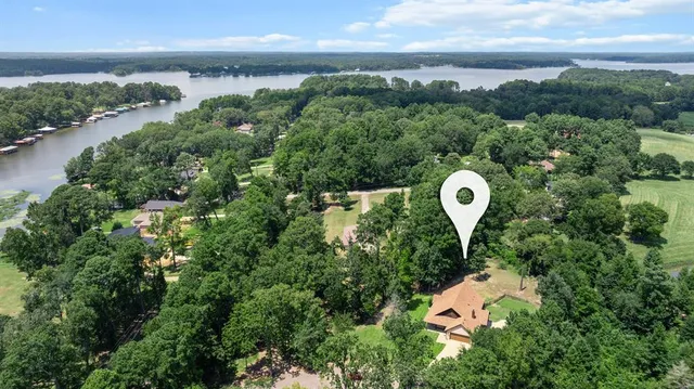 an aerial view of a house with garden space and outdoor space