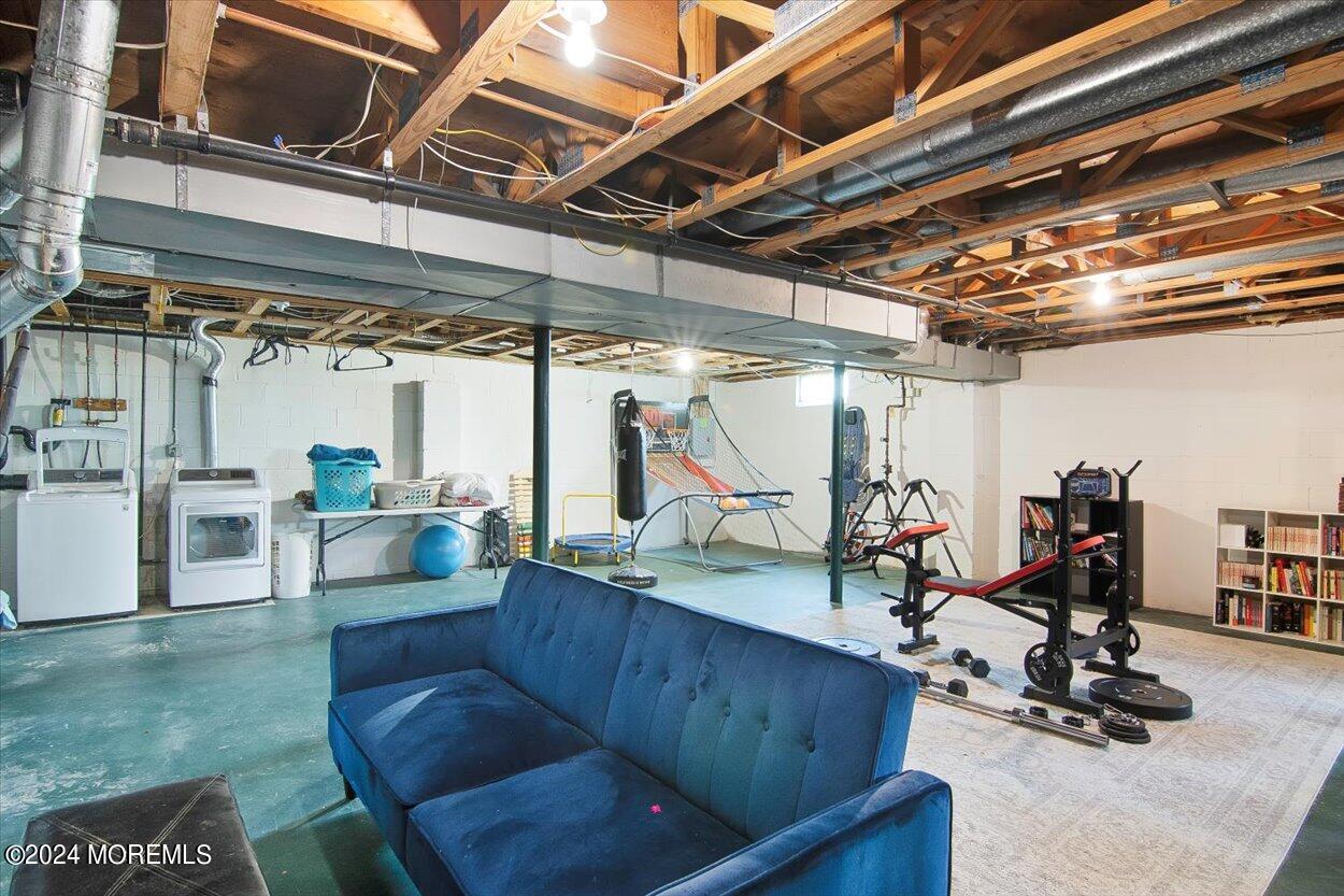 53 Racquet Road Wall, NJ 07719 - Photo 16 of 29 a view of a room with gym equipment