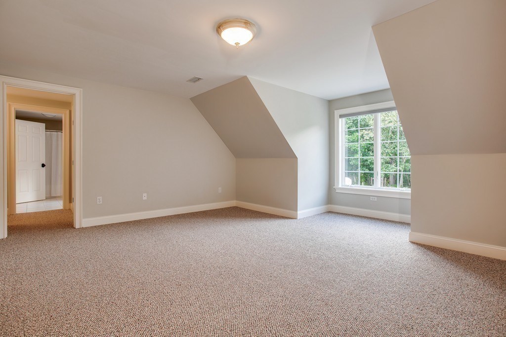 16 B Laurel Hollow Road Boxford, MA 01921 - Photo 23 of 39 an empty room with windows