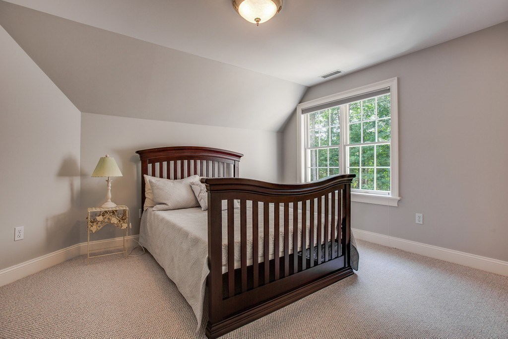 16 B Laurel Hollow Road Boxford, MA 01921 - Photo 26 of 39 a bed room with a bed and a window