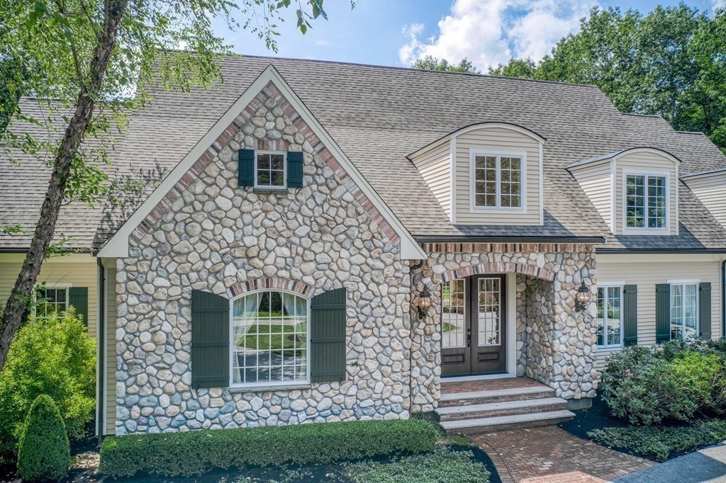 16 B Laurel Hollow Road Boxford, MA 01921 - Photo 3 of 39 a front view of a house with garden
