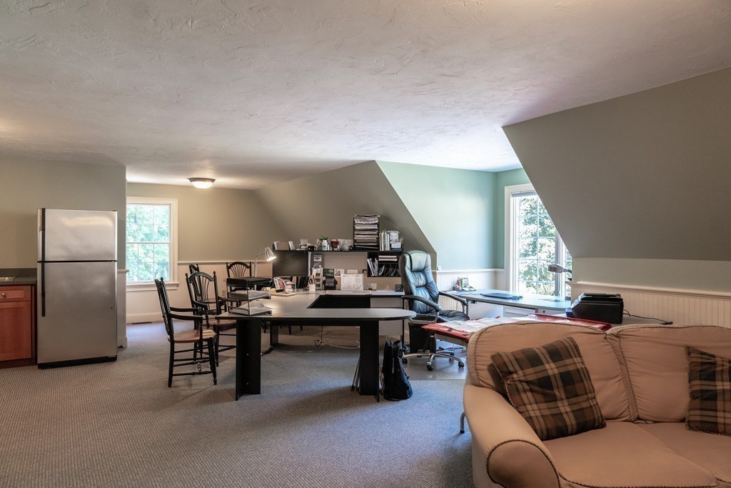 16 B Laurel Hollow Road Boxford, MA 01921 - Photo 31 of 39 a living room with furniture and a large window