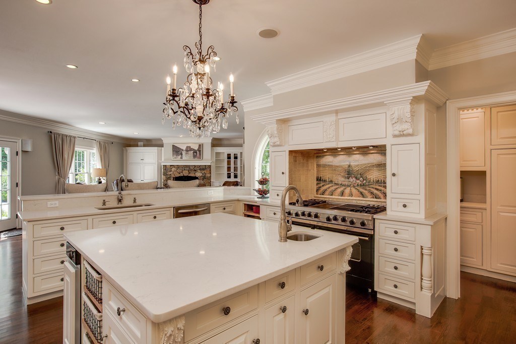 16 B Laurel Hollow Road Boxford, MA 01921 - Photo 8 of 39 a kitchen with a sink a stove and cabinets