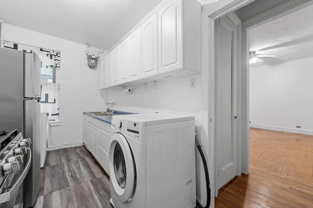 a utility room with dryer and washer