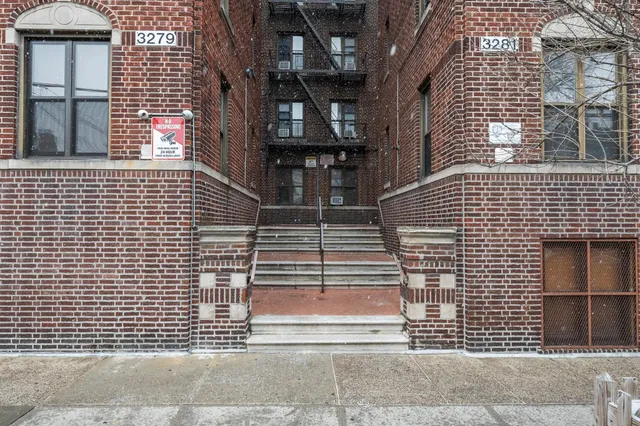 a view of swimming pool with a outdoor seating