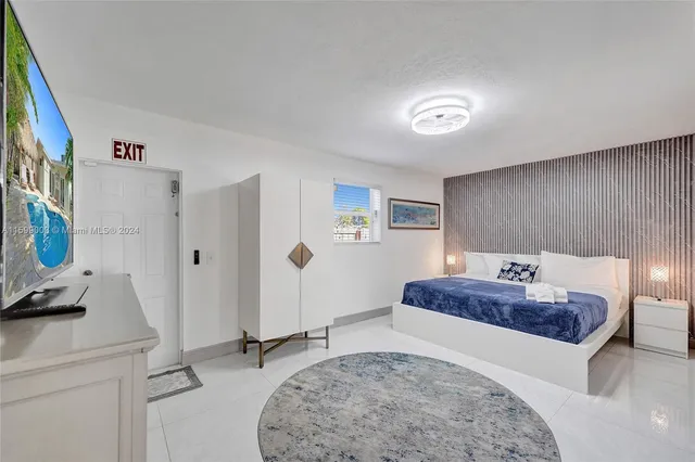 a kitchen with stainless steel appliances granite countertop a stove and a refrigerator