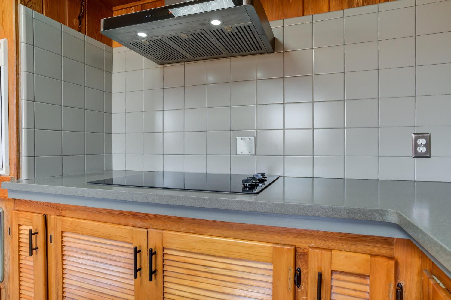3410 40th Street Lubbock, TX 79413 - Photo 15 of 45 a bathroom with a sink and mirror