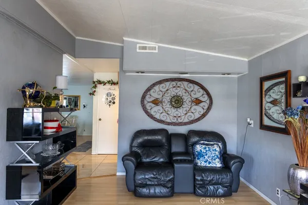 image of a livingroom with furniture and a fireplace